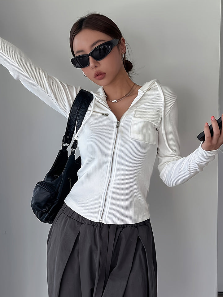 Comfortable cropped hoodie for women, ideal spring fashion & everyday style. Relaxed fit long-sleeve top.