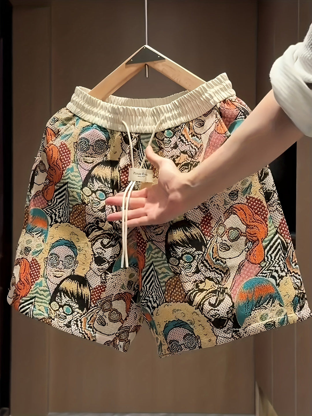 Retro pop art print unisex shorts, a vibrant graphic addition to summer streetwear and comfortable lounge fashion.