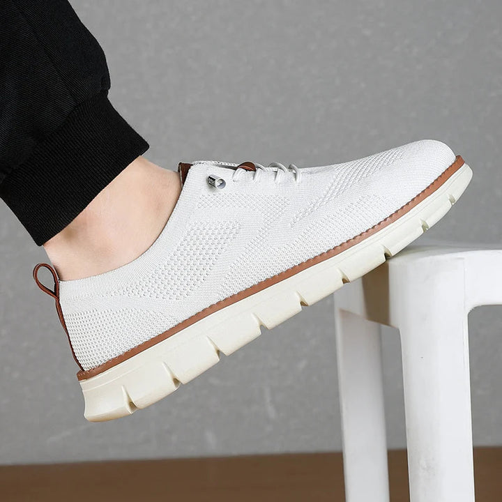 Comfortable men's athletic knit sneakers for daily wear. Breathable and lightweight casual slip-on shoes.