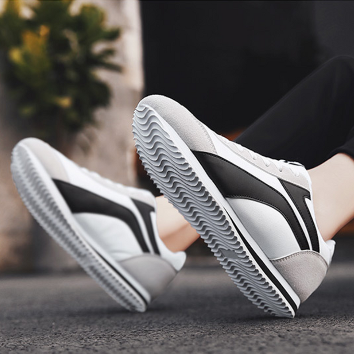 All-day comfortable men's RetroStride sneakers with a lightweight build & classic retro design.