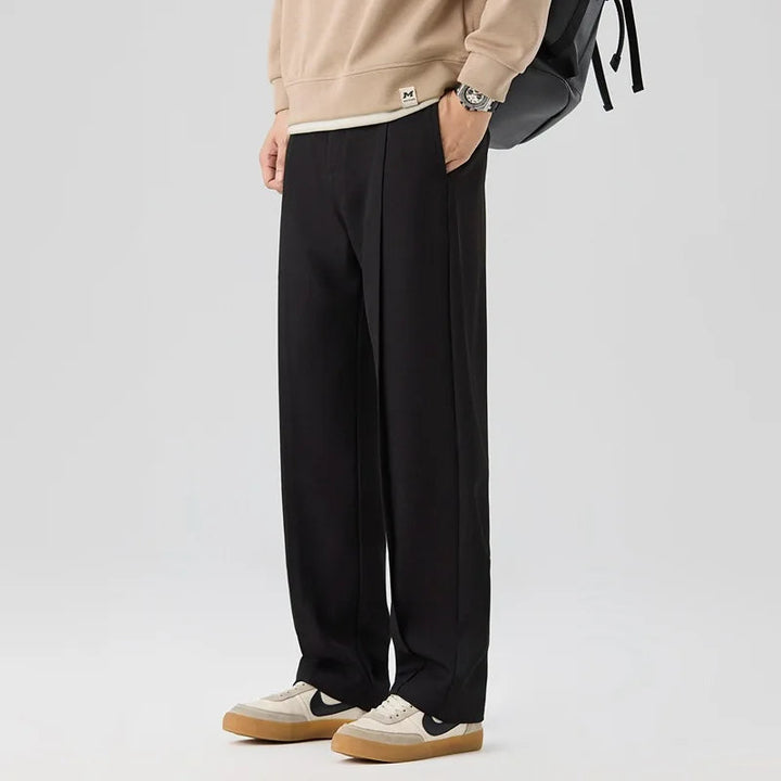Versatile men's pleated trousers, suitable as formal or casual drape pants for any occasion.