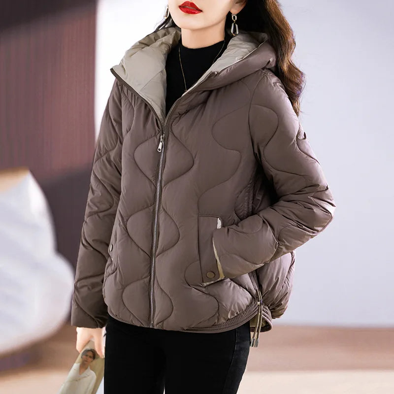 Versatile women's quilted puffer jacket, stylish outerwear for casual and chic fall & winter looks.
