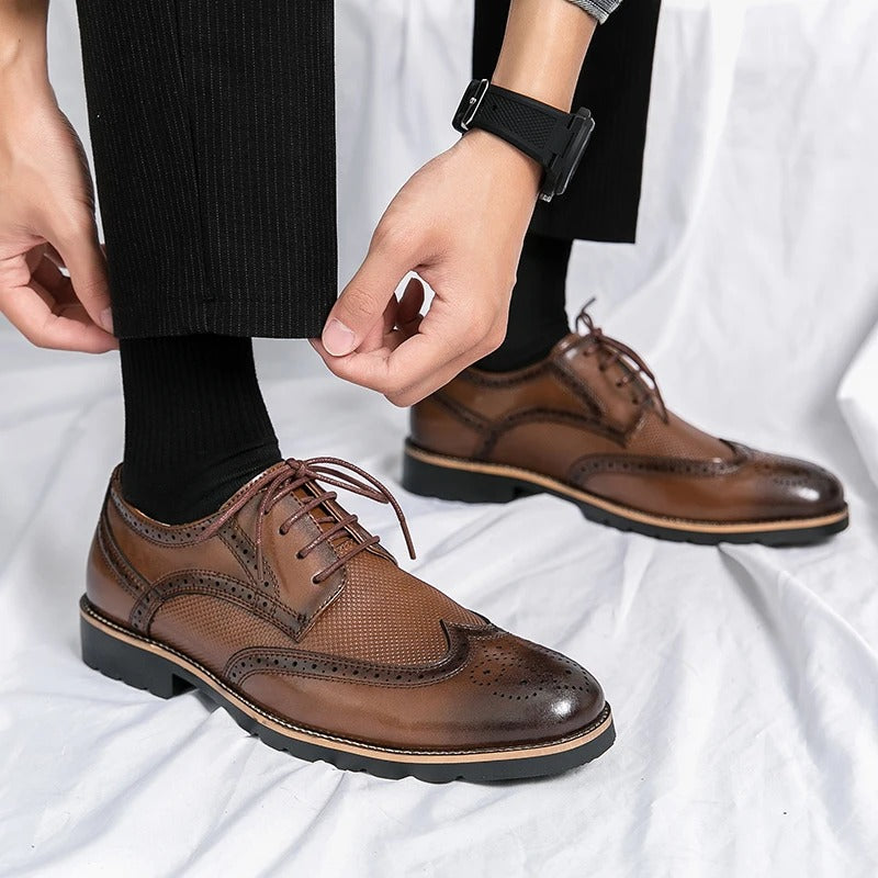 Men's timeless brown leather brogues, a sophisticated dress shoe for business, formal events, and smart casual outfits.