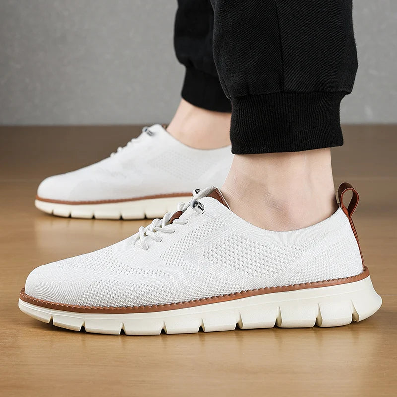 Lightweight men's breathable knit sneakers with slip-on design for ultimate all-day comfort & casual style.