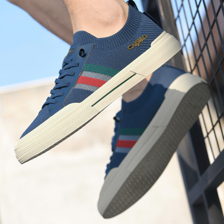 Close-up of lightweight fabric on men's comfort sneakers, ideal for everyday wear.