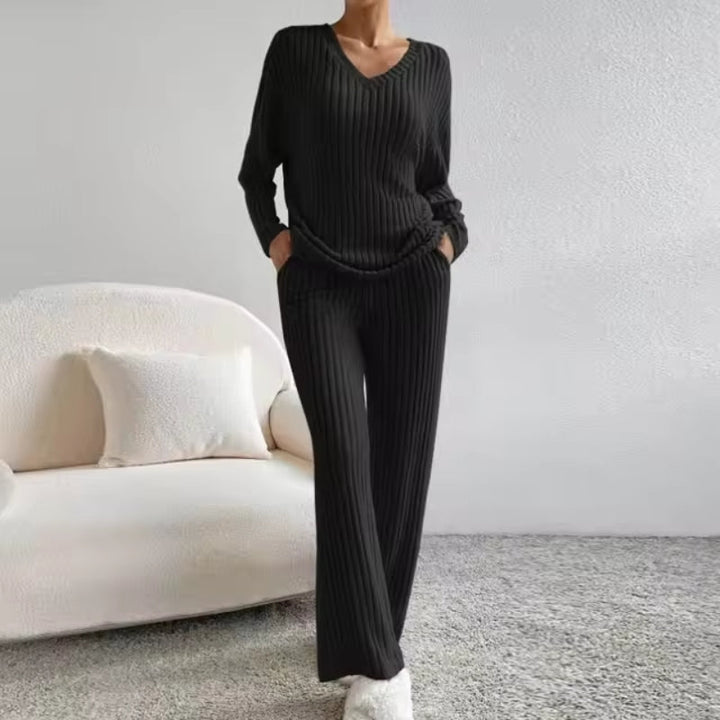 Comfortable ribbed knit trousers from a women's two-piece loungewear set. Cozy bottoms, perfect for relaxing or casual wear.