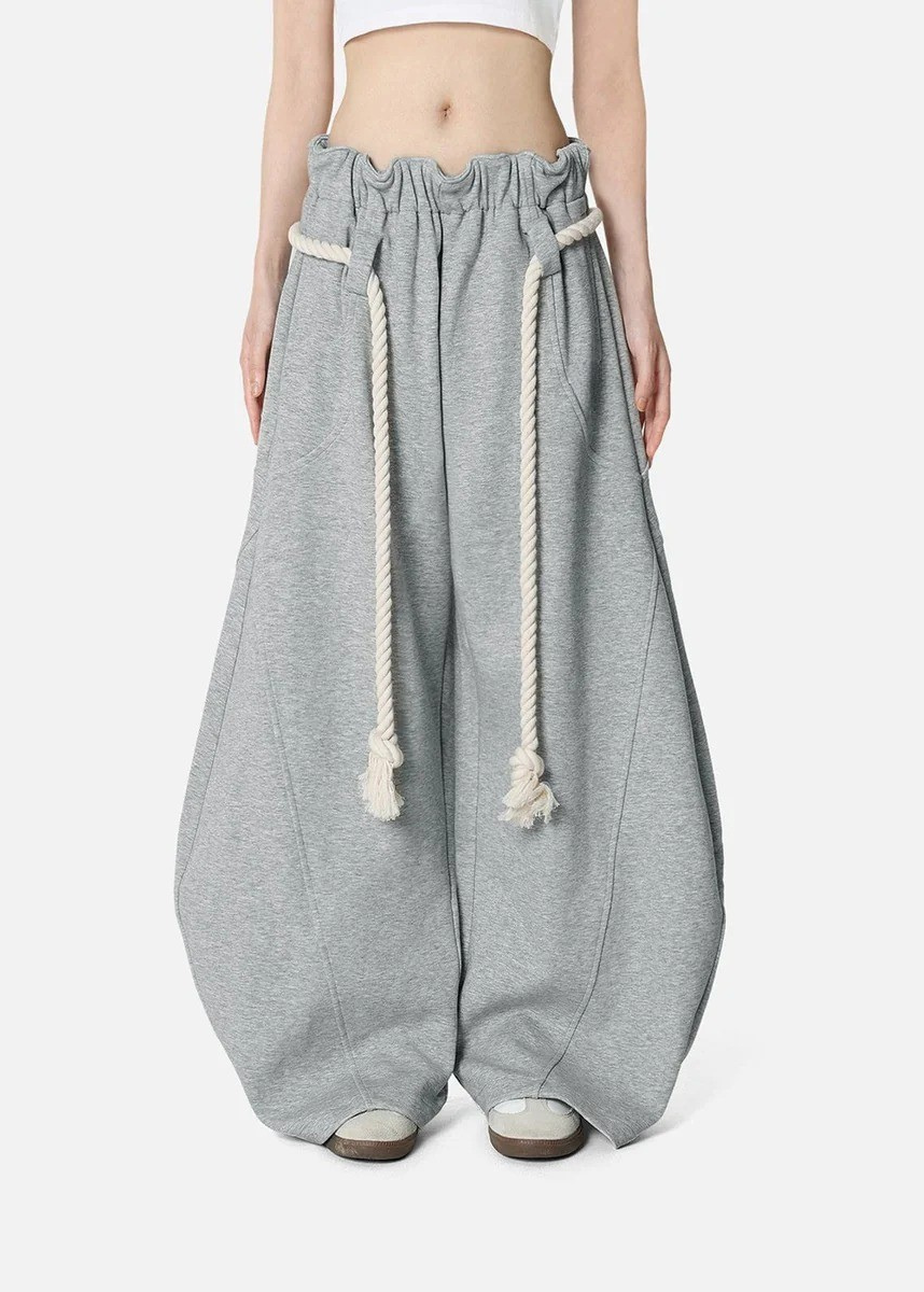 Cozy women's barrel leg comfort pants. High waist, loose fit, ideal for relaxed loungewear or casual wear.