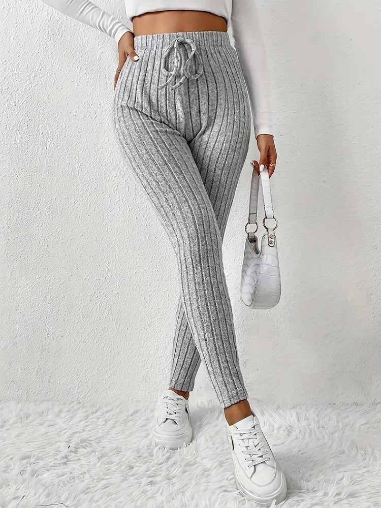 Stretchy ribbed high-rise women's leggings, comfortable slim fit, perfect for casual activewear.