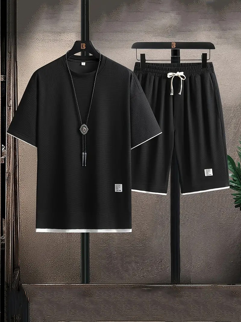 This men's waffle texture lounge set includes a relaxed fit t-shirt and shorts. Perfect for comfort.