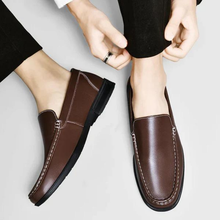 Men's comfortable dress loafers, classic slip-on footwear for formal and smart casual events.