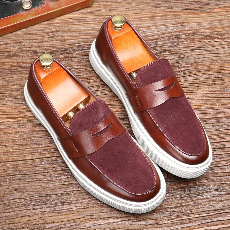 Pair of Men's Kensington classic slip-on loafers. Versatile & comfortable mens fashion footwear.