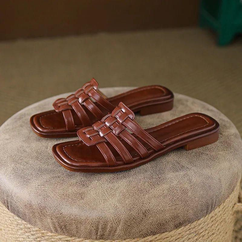 Brown Women's Tivra slide sandals, flat sole, open toe, cushioned for all-day comfort & style.