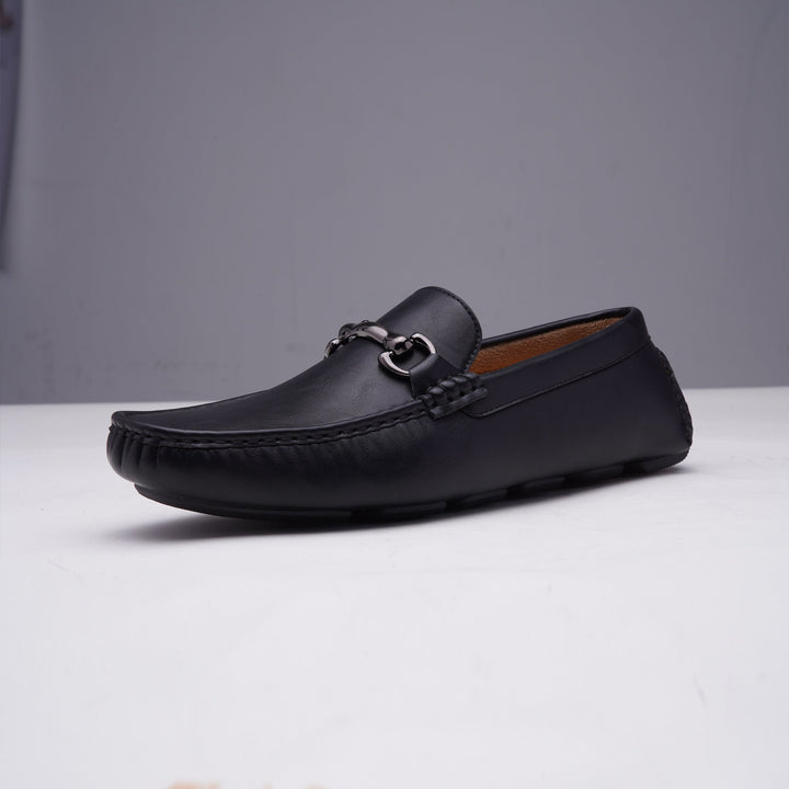 Sophisticated men's leather slip-on loafers. Ideal formal footwear for office, business meetings, or elegant events.
