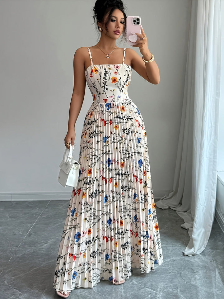 Elegant women's floral maxi dress, perfect for vacation or resort wear. Features a beautiful flowy design.