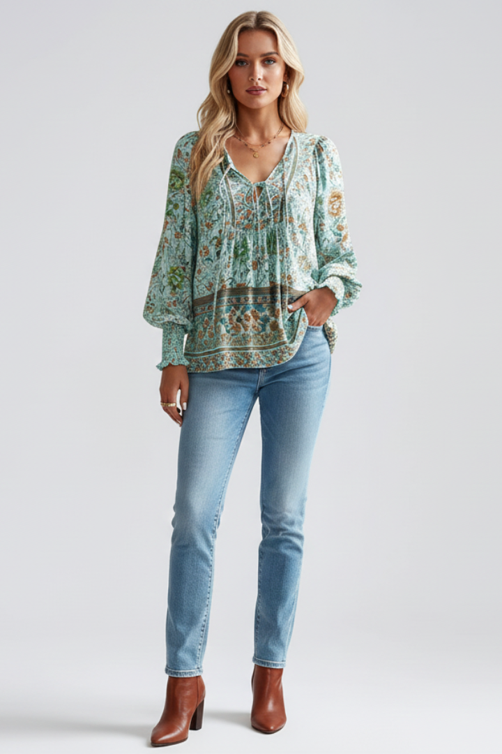 Comfortable women's loose fit floral print blouse with V-neck & long sleeves. Stylish for spring/summer.