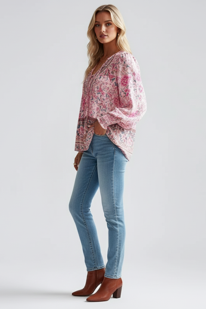 Stylish women's floral print V-neck blouse, loose fit & long sleeves. Great for spring/summer fashion.