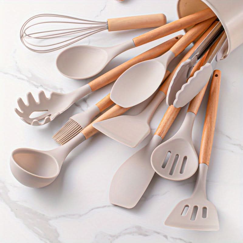 Durable 12-piece silicone utensil collection, heat resistant up to high temperatures, and dishwasher safe.