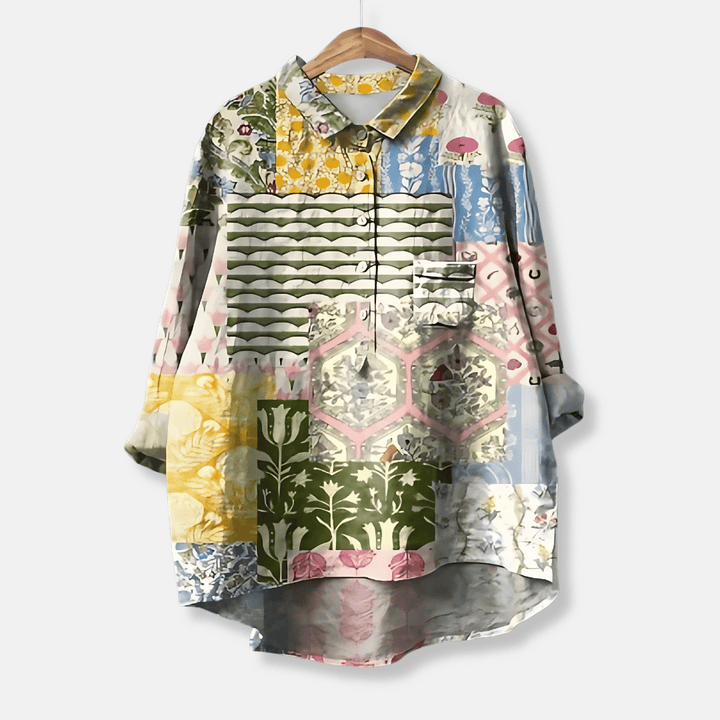Flowy loose fit women's floral long sleeve blouse, button front, perfect for relaxed elegant summer outfits.