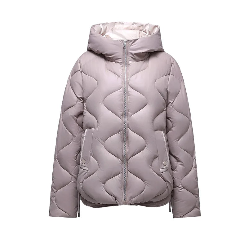 Women's warm quilted puffer jacket featuring cozy insulation, perfect for stylish outerwear.