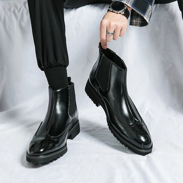 Sleek men's formal footwear: chelsea boots with traditional brogue, designed for comfort & elegance.