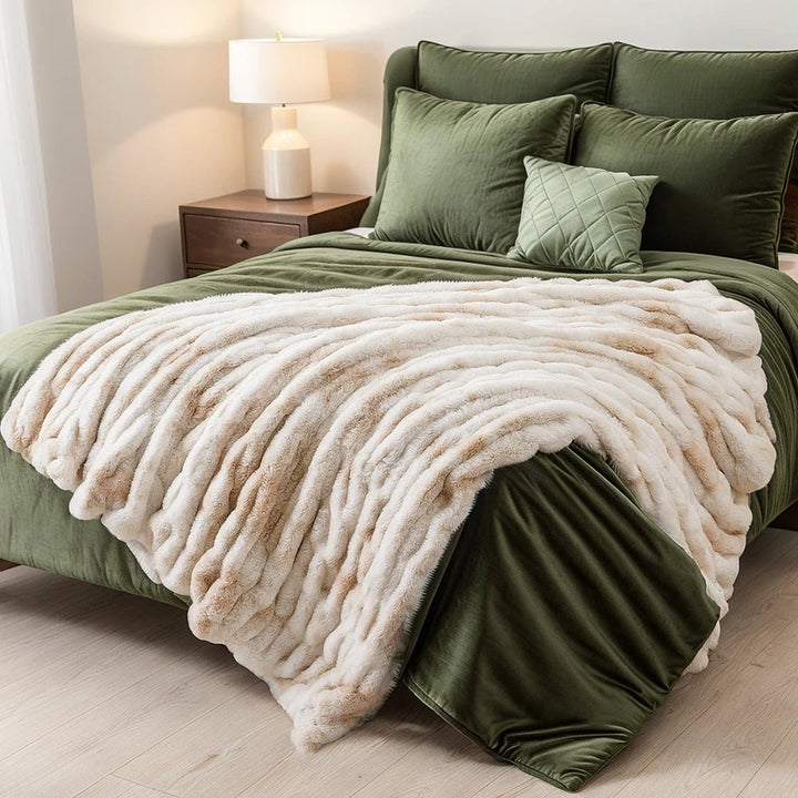 Cozy faux fur throw blanket, perfect for living room sofa, bedroom accent, or decorative styling.