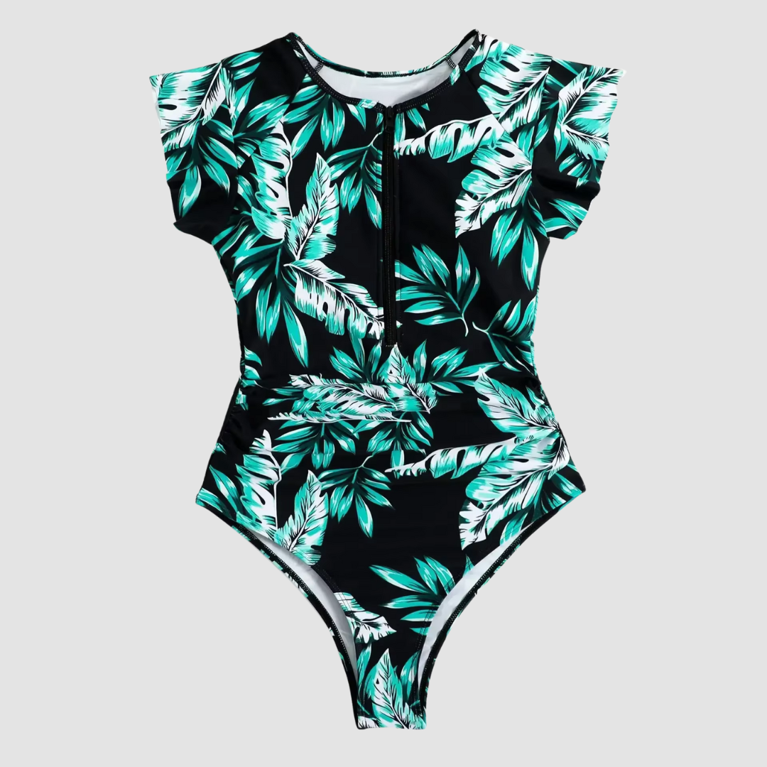 Stylish women's one-piece swimsuit with front zipper detail, perfect for poolside & resort wear.
