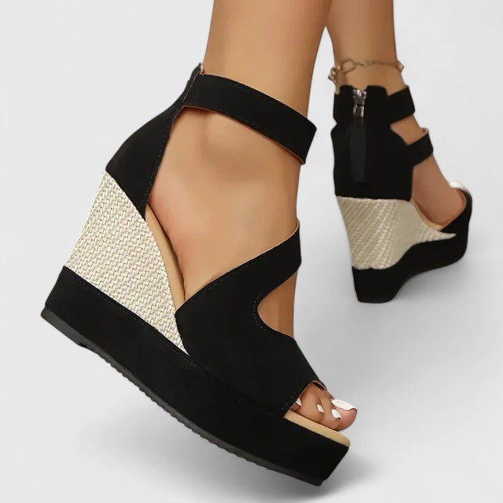 Comfortable women's orthopedic wedge sandals on a foot, ideal for stylish summer casual wear with essential arch support.