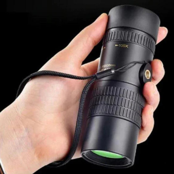 Waterproof HD monocular telescope with low-light night vision, ideal for camping, hiking, and wildlife observation.