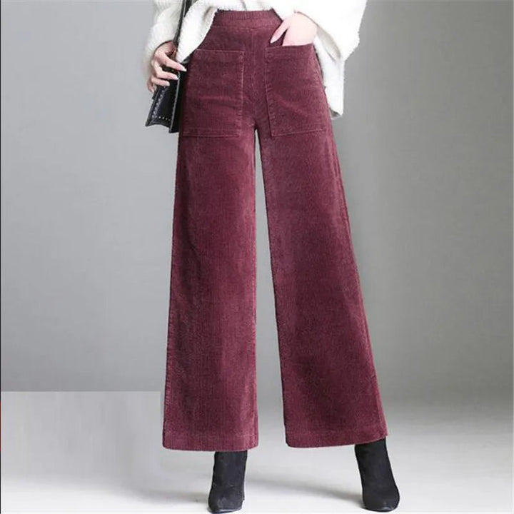 Sapphire navy retro high-waist flare trousers for women, versatile for casual or elegant semi-formal occasions.