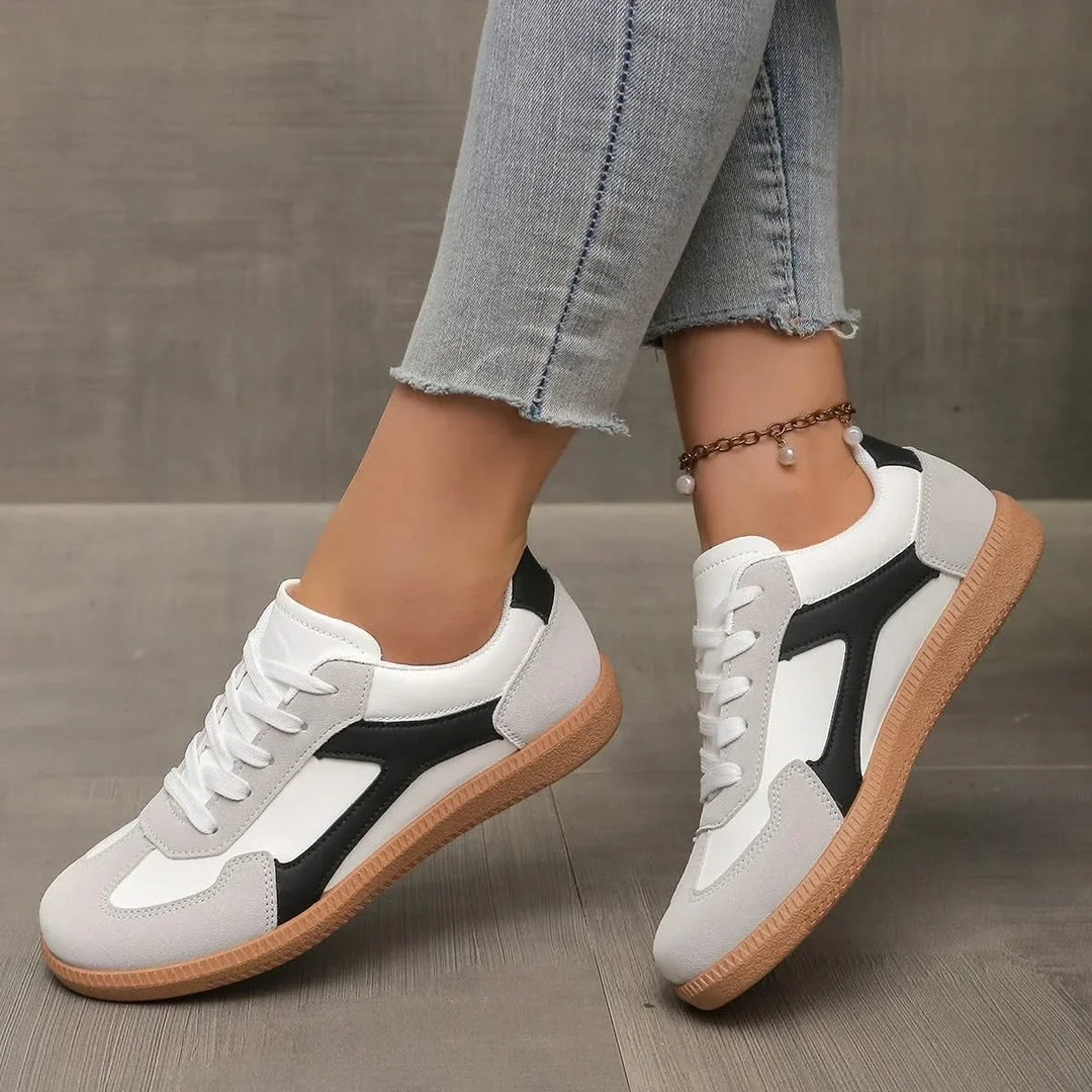 Stylish women's low-profile sneakers. Classic design, supportive for comfortable everyday wear & casual footwear.