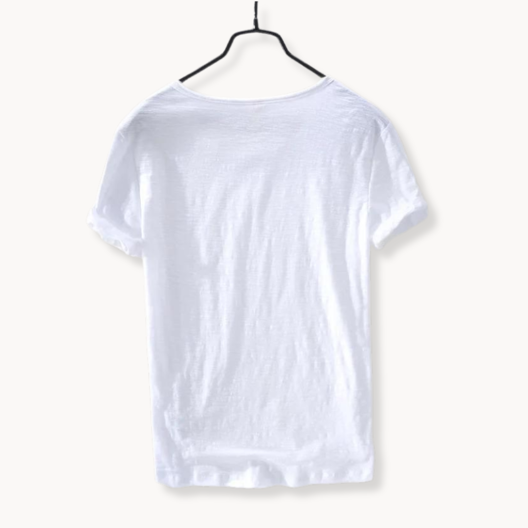 Man wearing a relaxed fit Ibiza shirt, a stylish long sleeve top for beach, travel, or casual wear.