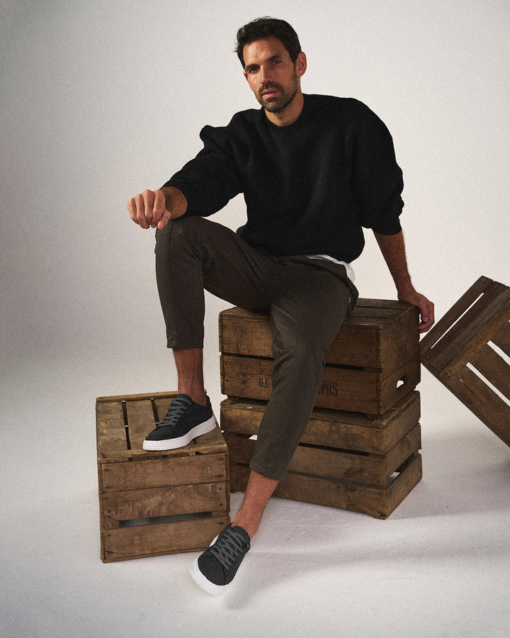 Side view of sleek men's everyday comfort sneakers, showcasing modern design and polished versatile look.
