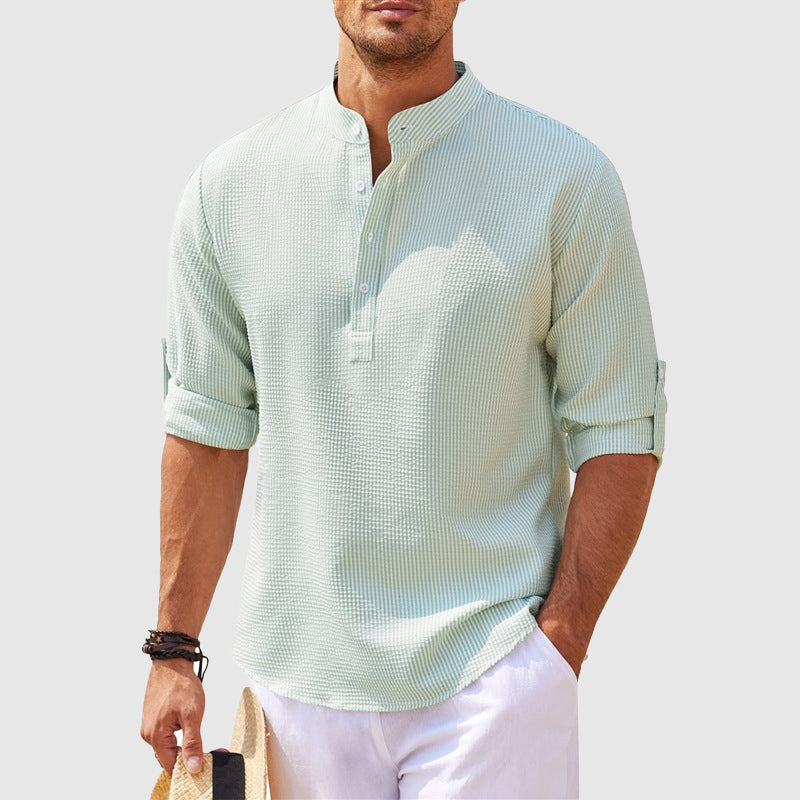Breathable men's henley shirt, perfect for summer. Lightweight fabric, relaxed fit, short sleeve casual top.