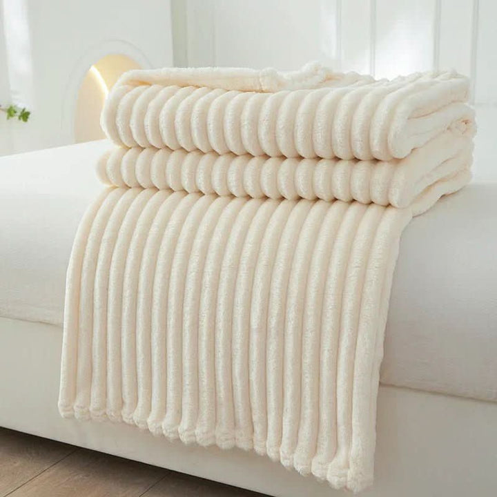 Luxurious striped flannel fleece blanket, providing cozy warmth and comfort for your home.