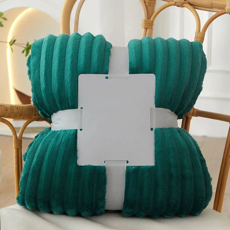 Soft striped flannel fleece blanket, a comfortable bed throw for chilly autumn evenings.