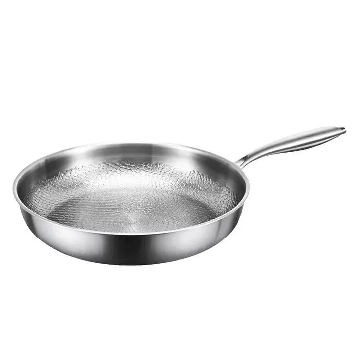 Chef-quality hammered titanium non-stick frying pan. Induction compatible, durable & easy-clean for gourmet home cooking.