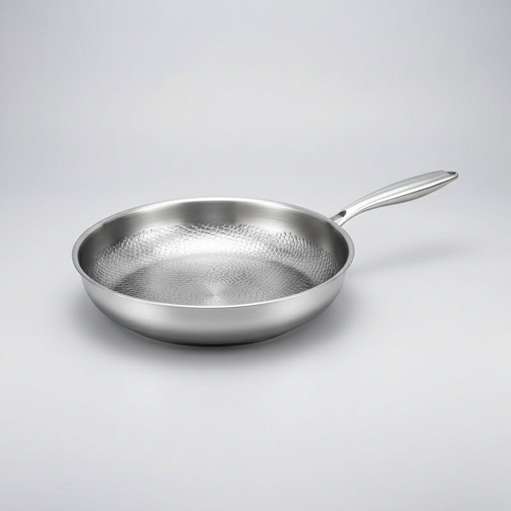 Hammered titanium non-stick frying pan for induction cooktops. Durable, easy-clean skillet, ideal for any home kitchen.