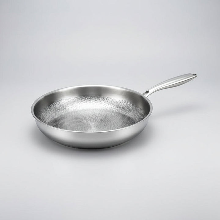 Hammered titanium non-stick frying pan for induction cooktops. Durable, easy-clean skillet, ideal for any home kitchen.