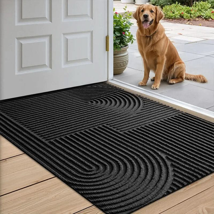 Absorbent entryway mat with elegant modern line pattern. A non-slip, washable home decor floor mat.