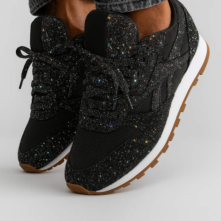 Stylish women's lace-up glitter platform sneakers with a chunky sole, ideal for fashion-forward outfits.