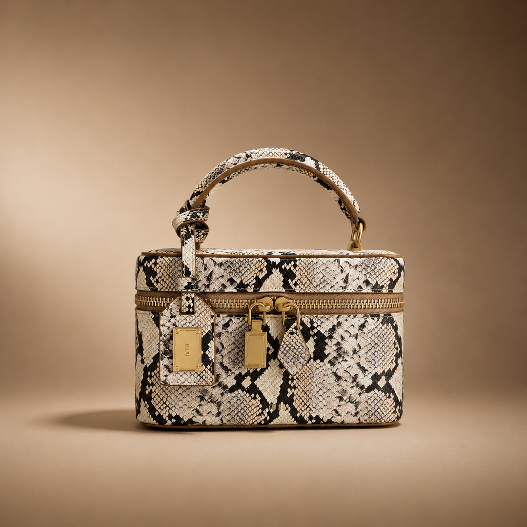 Black faux leather crocodile print box bag. Structured women's elegant handbag and versatile crossbody accessory.