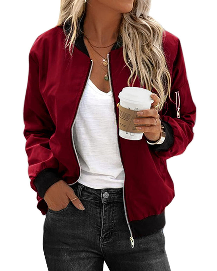 Effortless burgundy women's bomber jacket. A comfortable zip-up fall jacket for casual style.