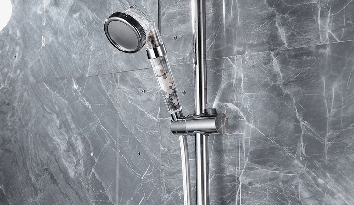 Universal fit mineral filter shower head delivering high pressure, cleaner water for better skin care and hair health.