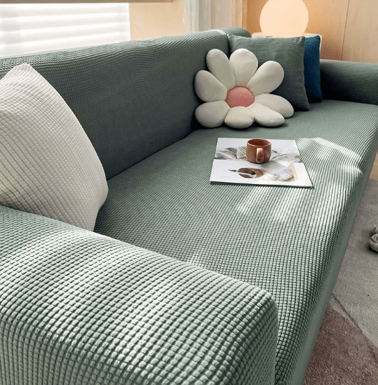 Textured jacquard non-slip sofa cover, pet-friendly & washable. Ideal furniture protector for modern living rooms.