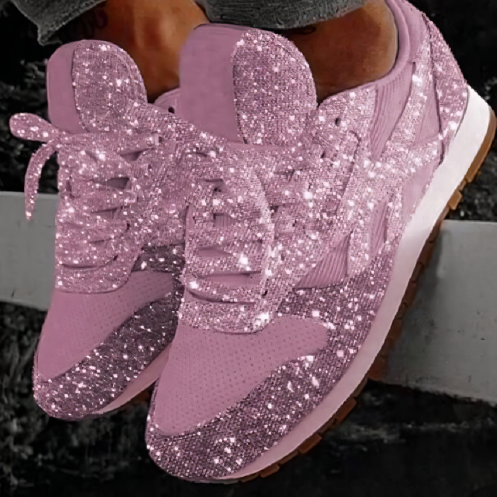 Fashionable women's glitter sneakers featuring a bold chunky platform design, great for casual wear.