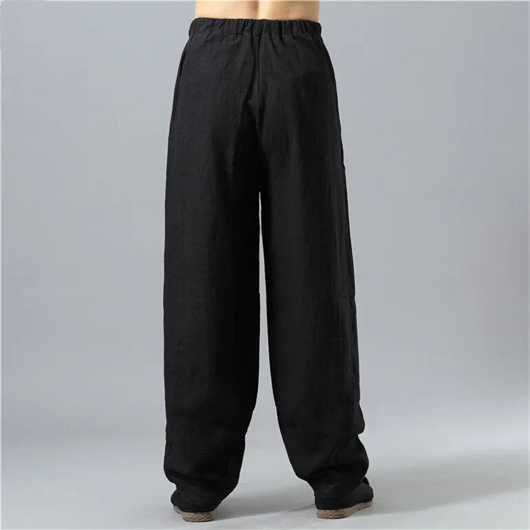 Full shot of unisex Kodama relaxed baggy pants, loose fit, ideal for effortless comfort & casual everyday style.