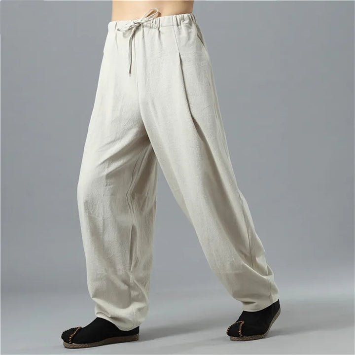 Back view of unisex Kodama relaxed baggy pants, showcasing the loose, comfortable, and breathable fit.
