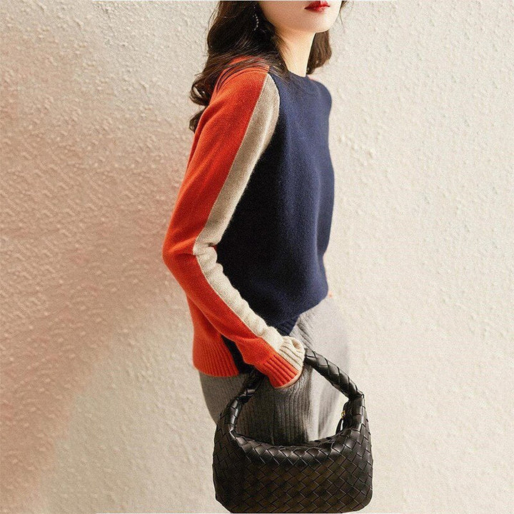 Elegant women's knit sweater with a comfortable, slim fit. Chic fashion knit top, ideal for versatile styling.