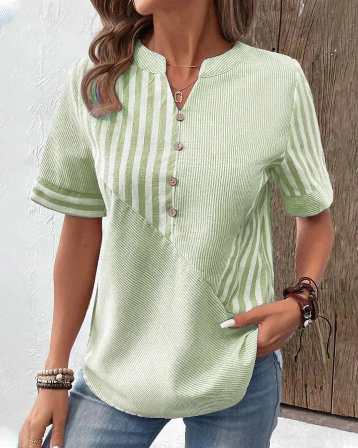 Versatile women's colorblock striped half-button blouse, great for office or weekend wear.