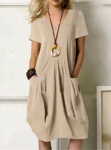 Comfortable women's casual short sleeve midi dress with gathered details and pockets, ideal for versatile summer style.